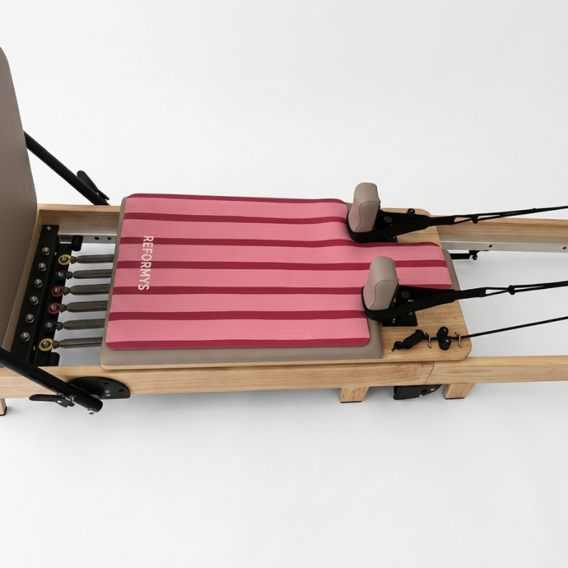 Side view of Reformys Pilates Reformer Mat in Sweet Rebel