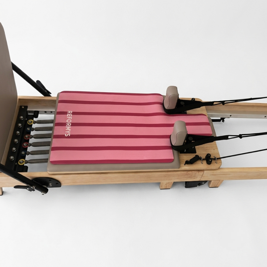Side view of Reformys Pilates Reformer Mat in Sweet Rebel